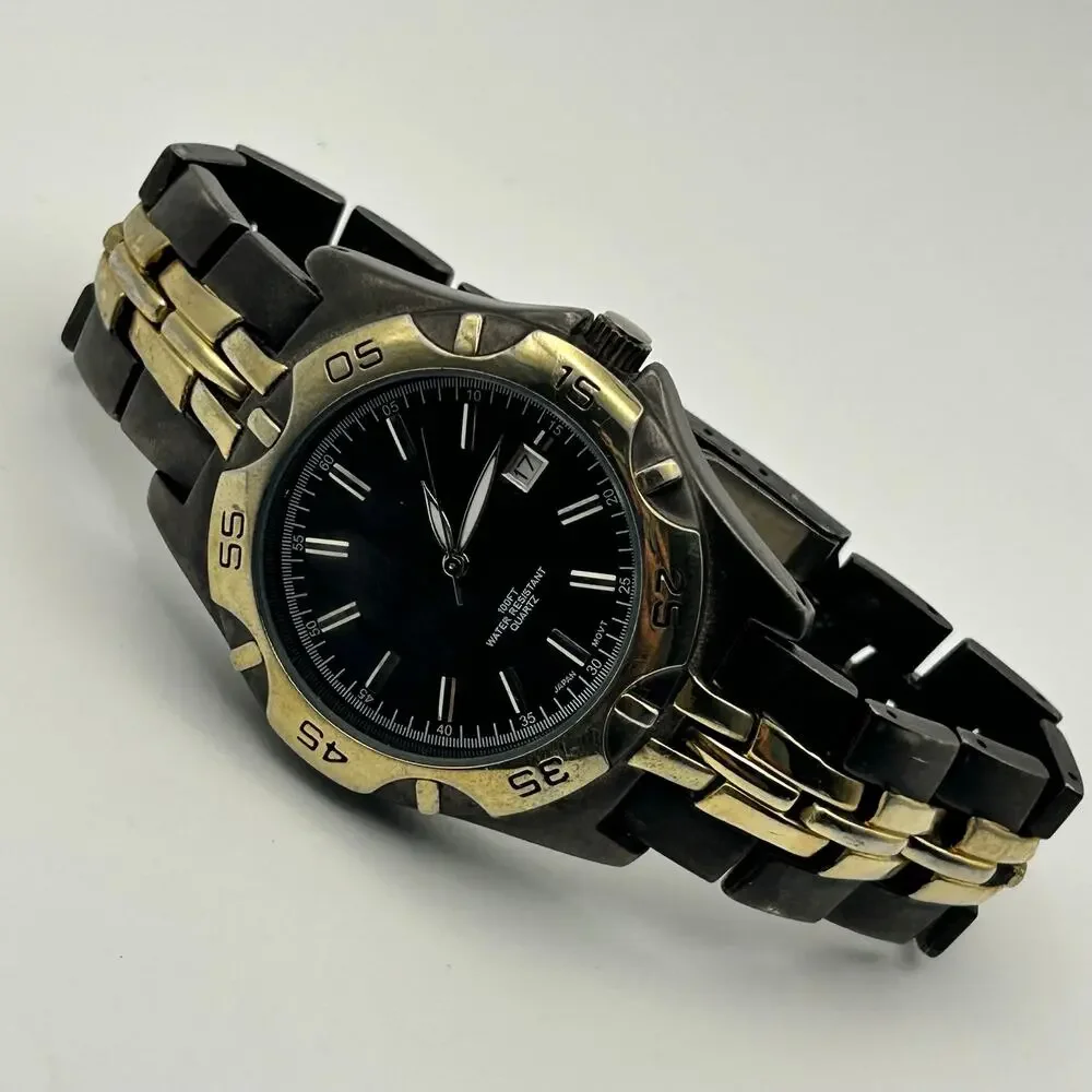 Men’s Gold and Black Stainless Steel Men’s Watch Working New Battery